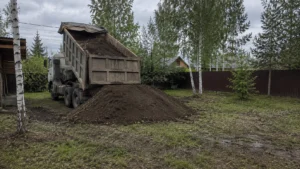 Подготовка основания участка для укладки или посева газона.